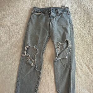 Levi  Jeans With Holes in Knees